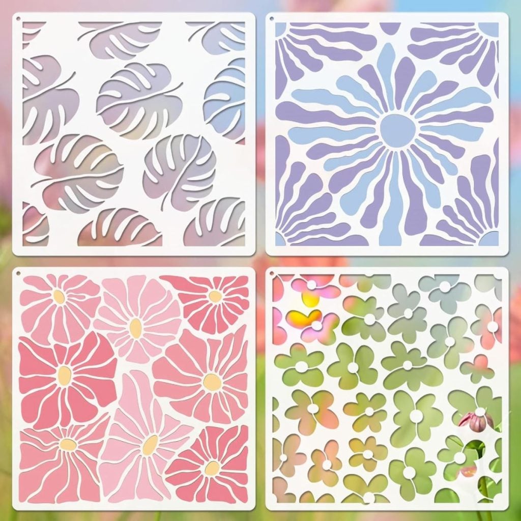 Four square stencils with different floral and leaf patterns, each in pastel colors, arranged in a 2x2 grid against a blurred background.