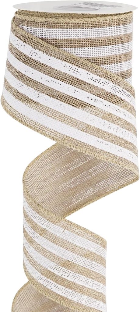 A spool of wired burlap ribbon with alternating white and natural tan horizontal stripes, partially unrolled and curling downward.