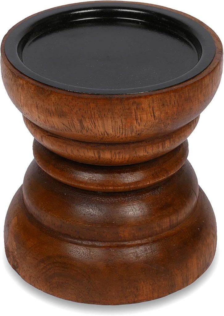 A small, round wooden pedestal with a stepped base and a flat black top surface, perfect for displaying Burlap Christmas Trees or other festive decor.