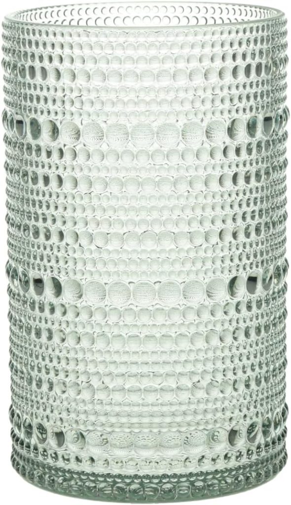 A clear glass tumbler with a textured, raised bubble pattern covering its entire surface—perfect for upgrading your tableware during Amazon Prime Big Deal Days.