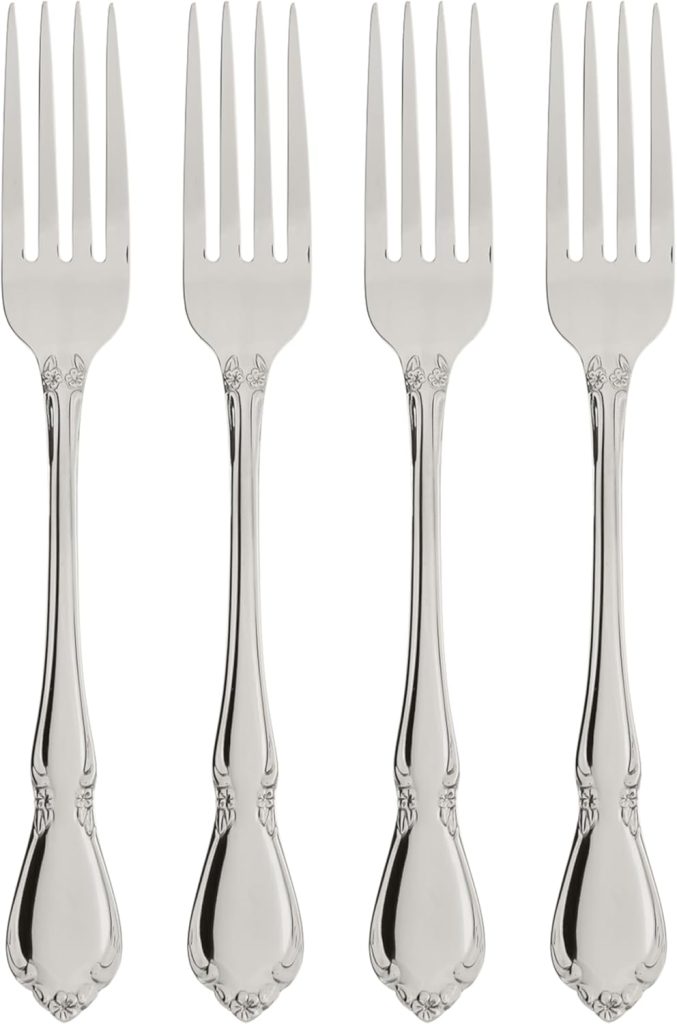 Four identical silver forks with ornate handles are arranged in a straight row against a white background, perfect for elevating your table setting during Amazon Prime Big Deal Days.