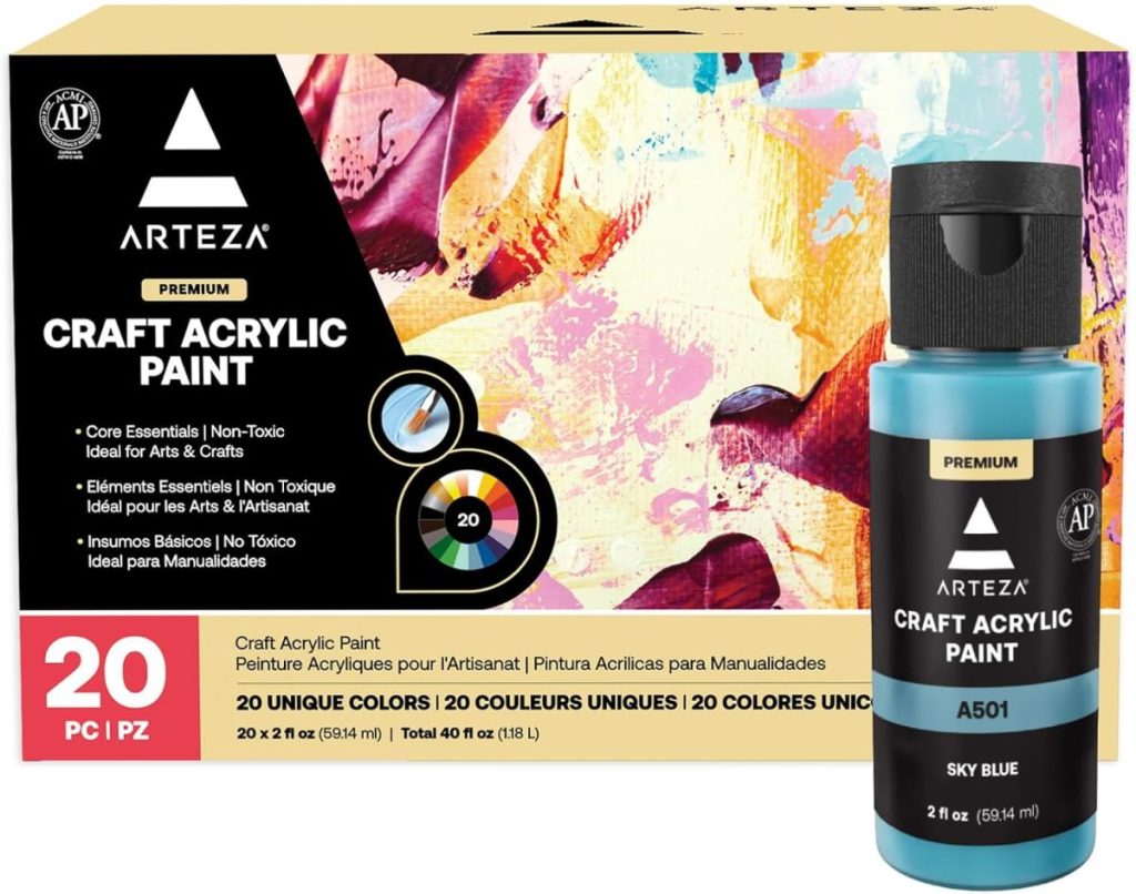 Box and bottle of Arteza Premium Craft Acrylic Paint in sky blue, featuring 20 unique colors, non-toxic formula, and 2 fl oz bottle.