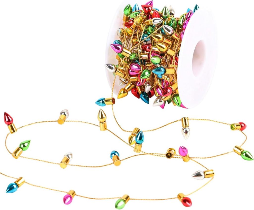 A spool of gold string with colorful metallic bead decorations shaped like Christmas lights, perfect for accenting Glitter Christmas Trees.