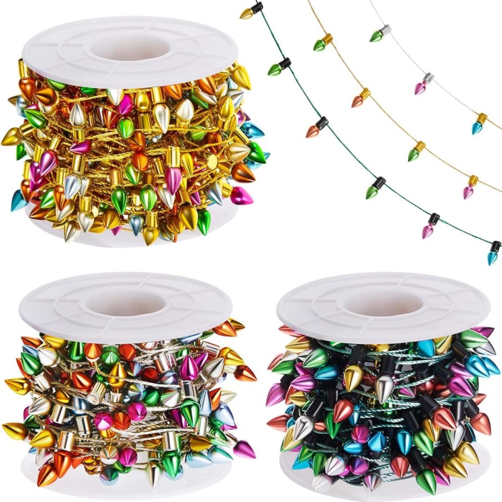 Four spools of multicolored bead garland shaped like Christmas lights, perfect for pairing with Glitter Christmas Trees, with a strand of the garland displayed above.
