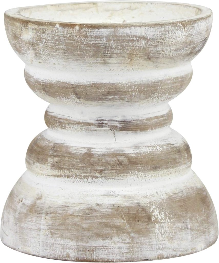 A rustic, whitewashed wooden candle holder with a curved, symmetrical design and distressed finish.