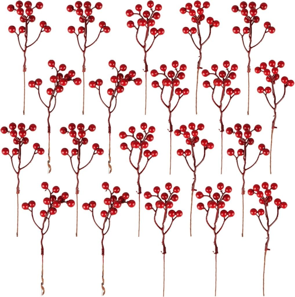 A group of artificial red berry stems, reminiscent of festive pumpkin pie gatherings, arranged in rows on a white background.