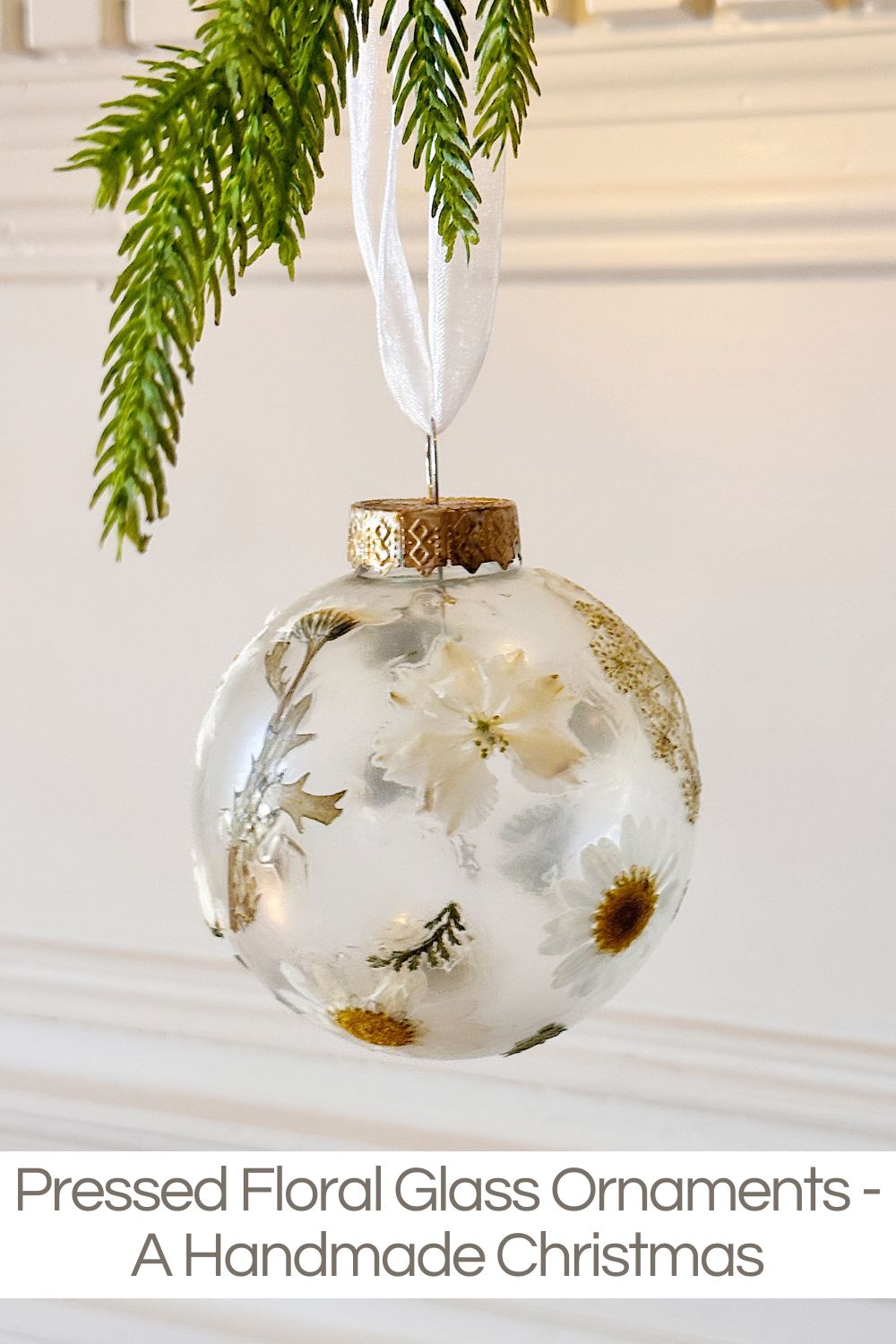 It's week seven of my 16-week series titled A Handmade Christmas, and today I am sharing my Pressed Floral Glass Ornaments.