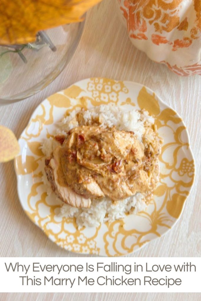 A plate of rice topped with creamy chicken in a sauce, placed on a yellow patterned plate, with a floral napkin nearby. Text overlay reads: Why Everyone Is Falling in Love with This Marry Me Chicken Recipe.