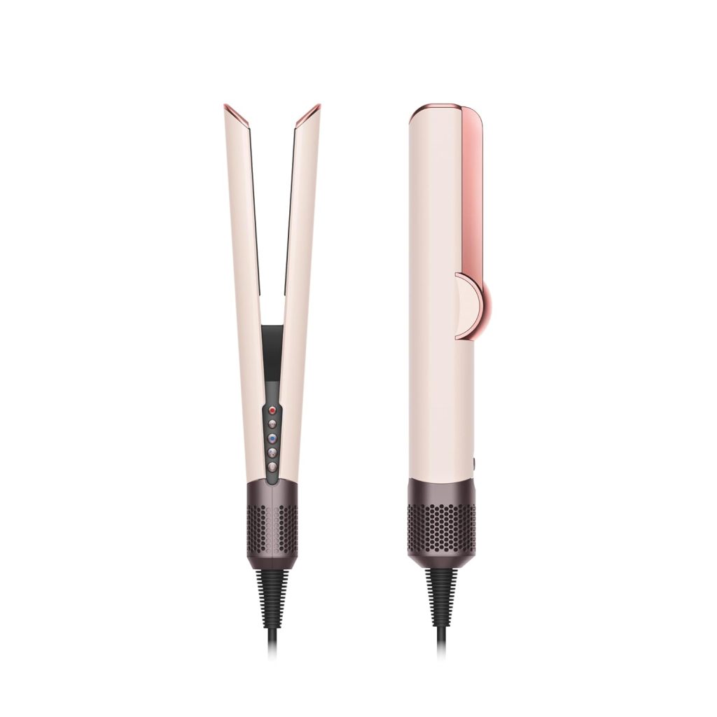 A pink and rose gold hair straightener shown from the front and side, featuring control buttons and a power cord at the base.