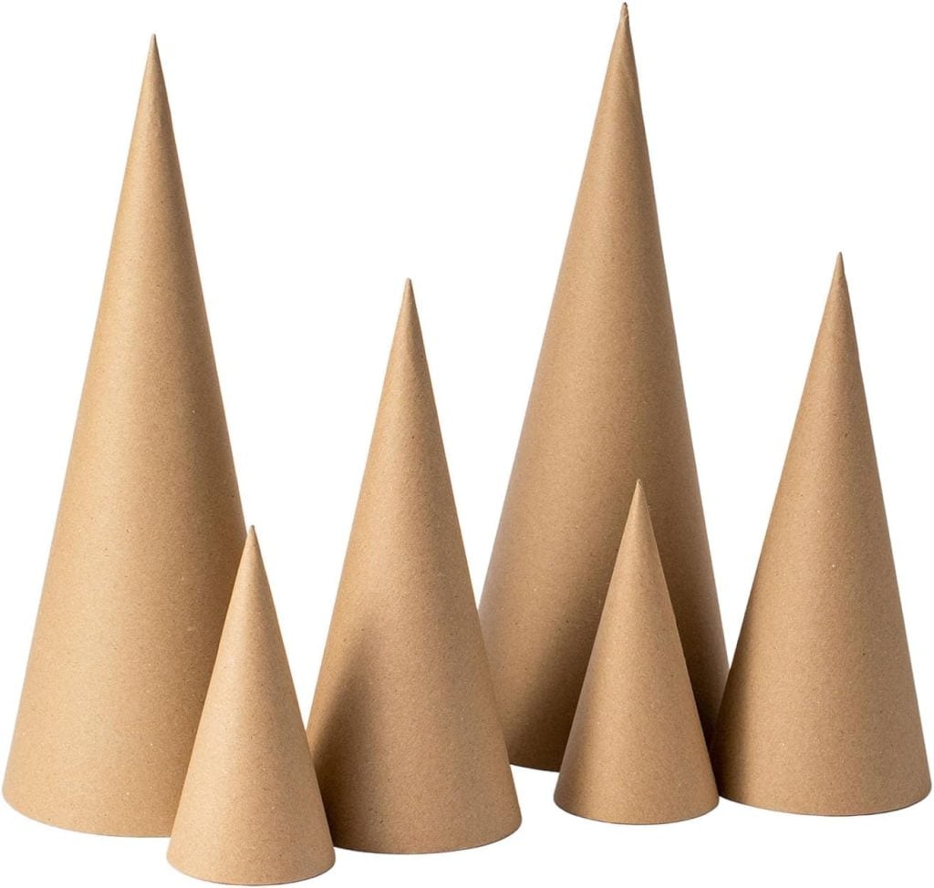 Six brown paper cones of varying heights are arranged upright in a group against a white background.