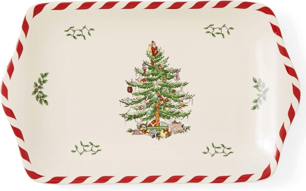 Rectangular ceramic platter with a Christmas tree and presents in the center, surrounded by holly sprigs and a red-and-white striped border.