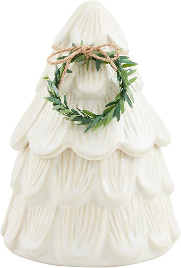 White ceramic Christmas tree figurine with a small green wreath and twine bow near the top, perfect as festive window art for your holiday décor.