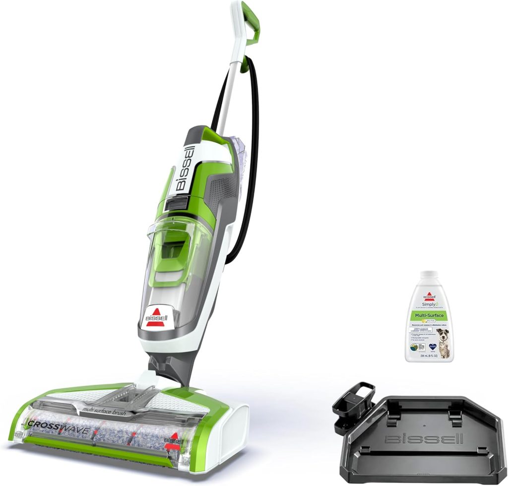 A Bissell CrossWave vacuum and mop is shown with a cleaning solution bottle and a black tray attachment on a white background—an ideal hostess gift for anyone who loves a spotless home.