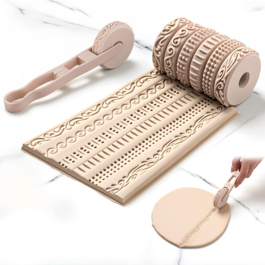 A set of decorative rolling pins and a cutter used to emboss patterns onto a sheet of dough and along the edge of a circular pastry.