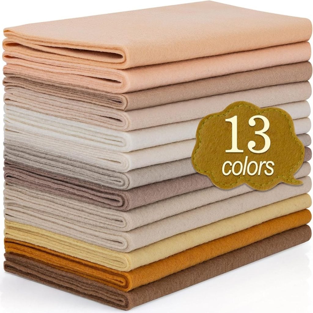 A neatly stacked set of 13 rectangular felt sheets in various neutral and earth-tone colors with a "13 colors" label on top.