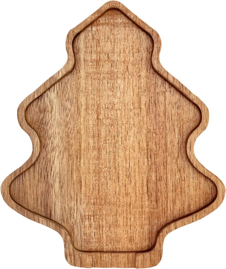 A wooden serving tray shaped like a Christmas tree, viewed from above on a plain background.