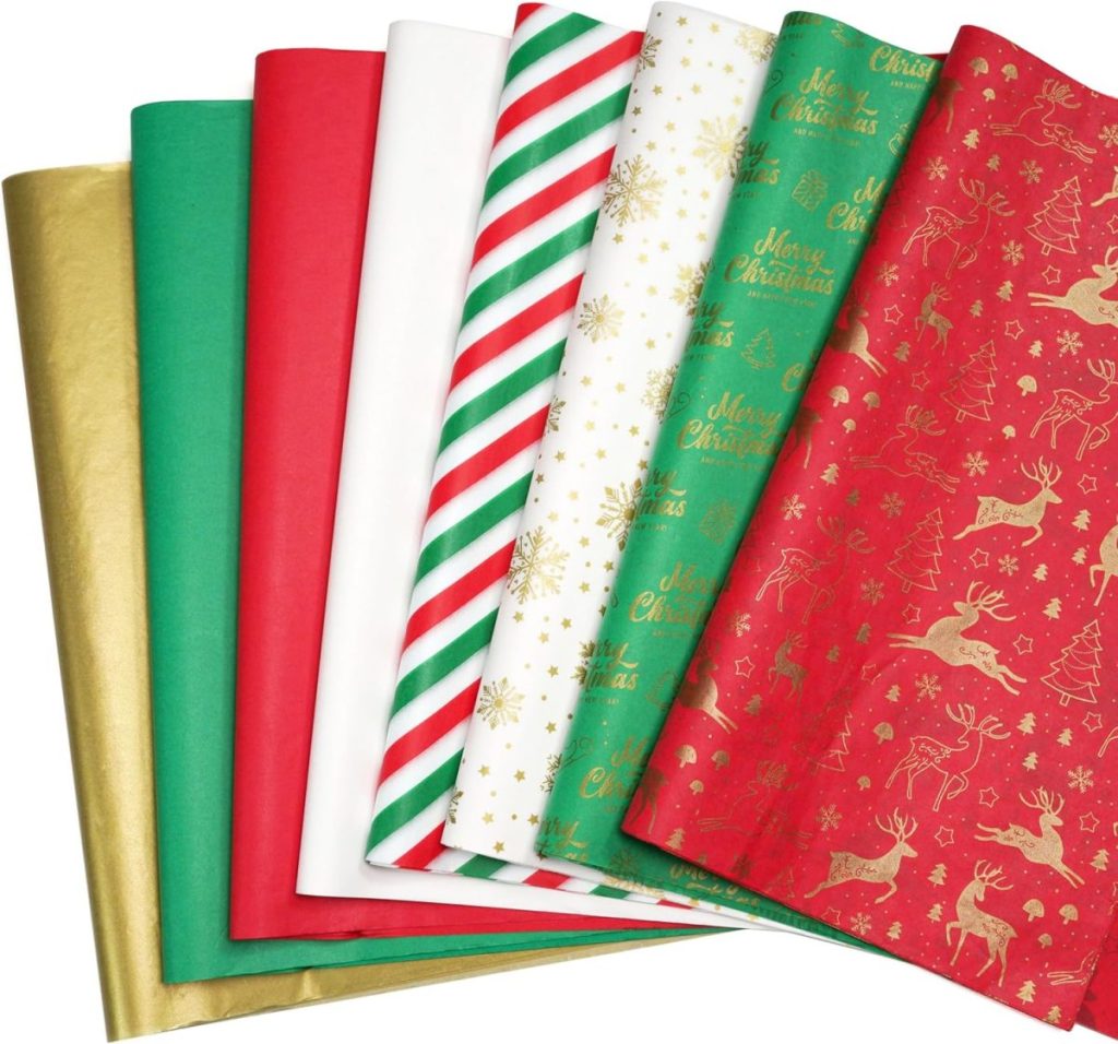 Seven sheets of Christmas-themed wrapping paper, featuring solid colors, stripes, gold snowflakes, "Merry Christmas" text, and gold reindeer patterns—perfect for wrapping a thoughtful hostess gift this holiday season.