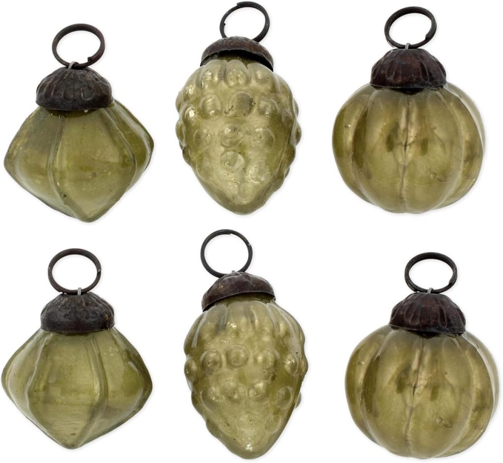 Six vintage, green glass Christmas ornaments in various shapes, each with a metal cap and loop for hanging, arranged in two rows on a white background.