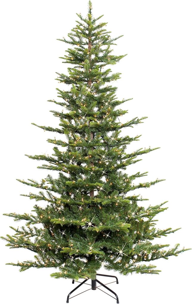 Artificial Christmas tree with green branches and a black metal stand, decorated with small white lights.
