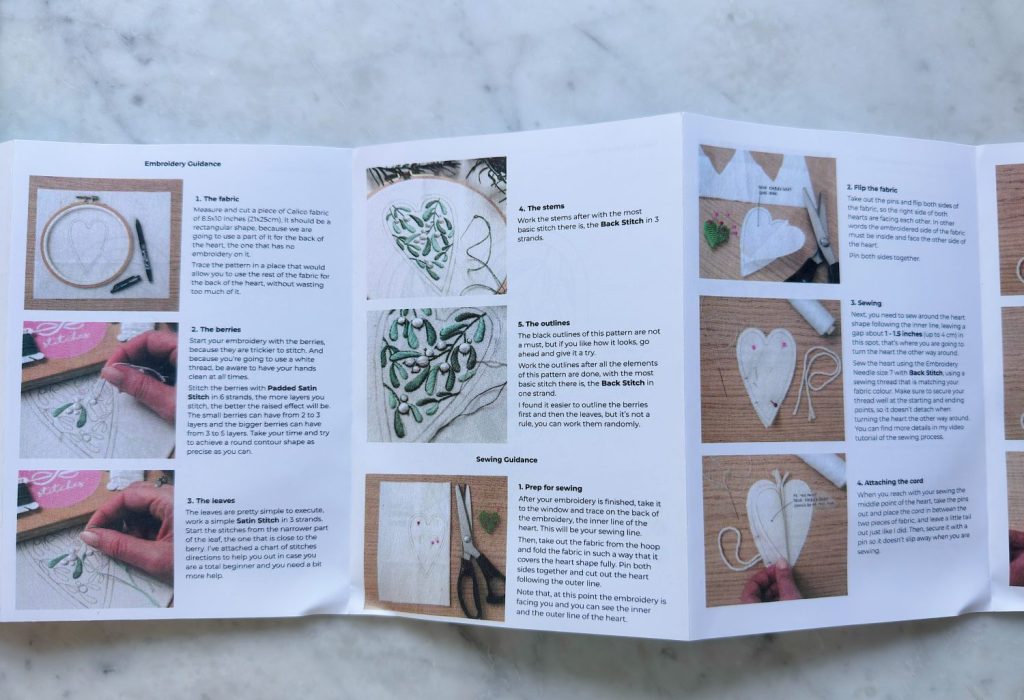 An instructional pamphlet on embroidery shows step-by-step photos and text, including tools, stitching, creating patterns, and assembling a heart-shaped fabric piece.