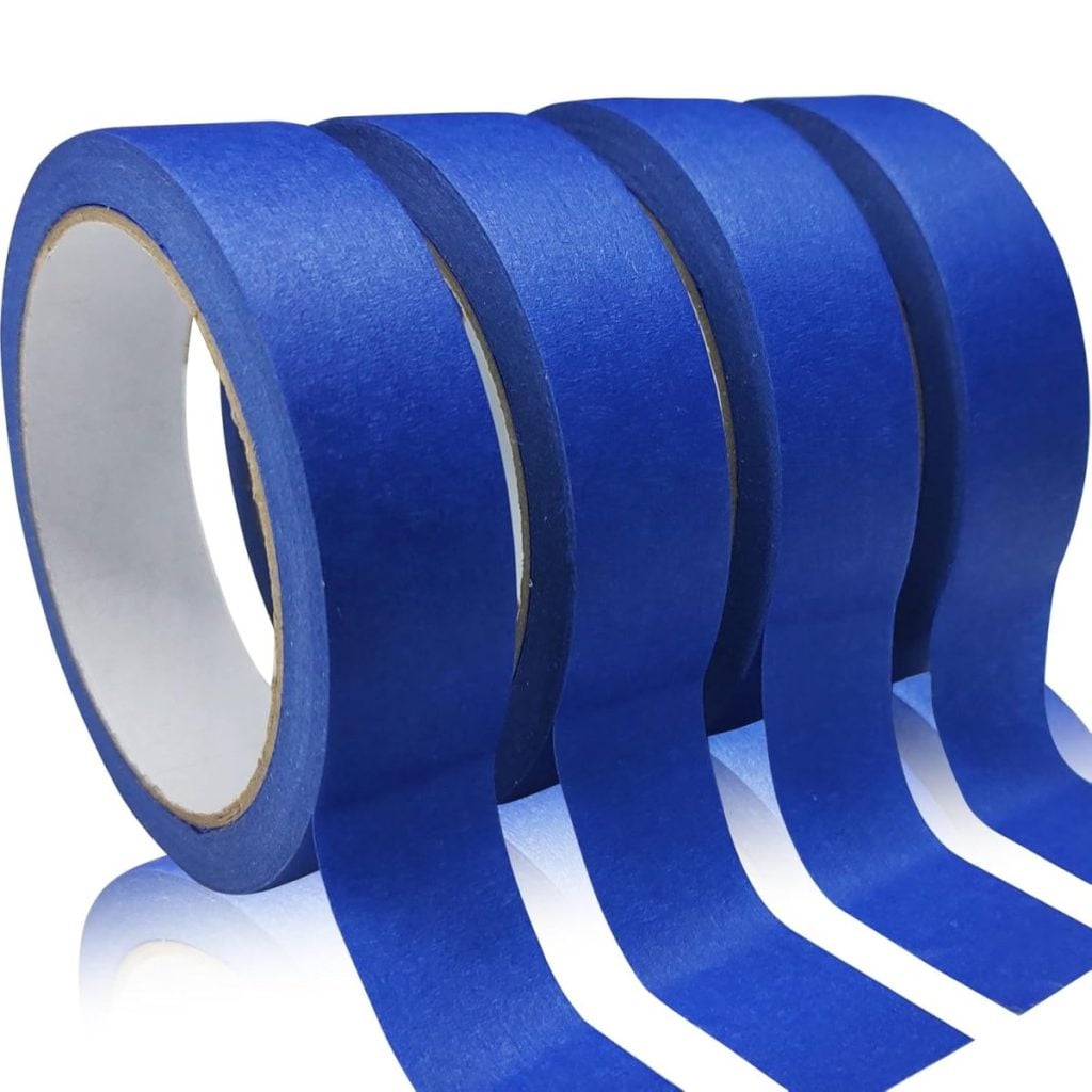 Four rolls of blue painter's tape in different widths are lined up, with each roll partially unwound to display the tape.