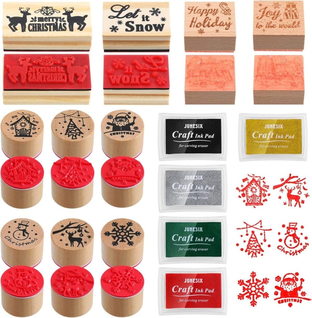Assorted Christmas-themed rubber stamps, ink pads in various colors, and festive imprint designs including snowflakes, reindeer, Christmas trees, and holiday messages.