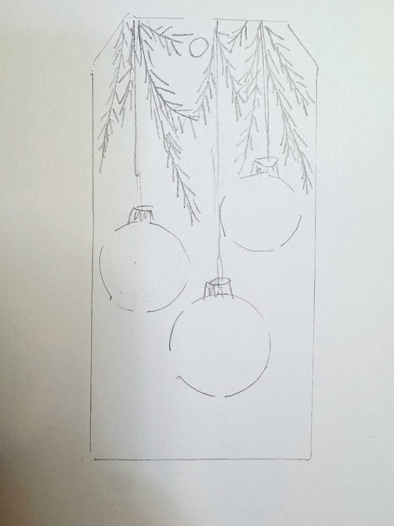 Pencil sketch of three hanging ornaments and pine branches on a rectangular tag.