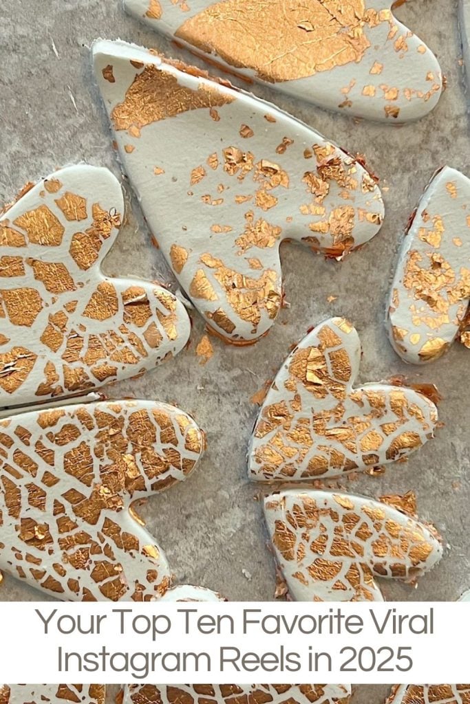 Several heart-shaped clay pieces decorated with gold leaf rest on a textured surface. Text at the bottom reads, "Your Top Ten Favorite Viral Instagram Reels in 2025.