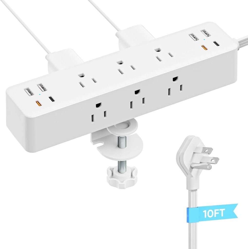 A white power strip with six outlets, four USB ports, a clamp for mounting, and a 10-foot cord with an angled plug.