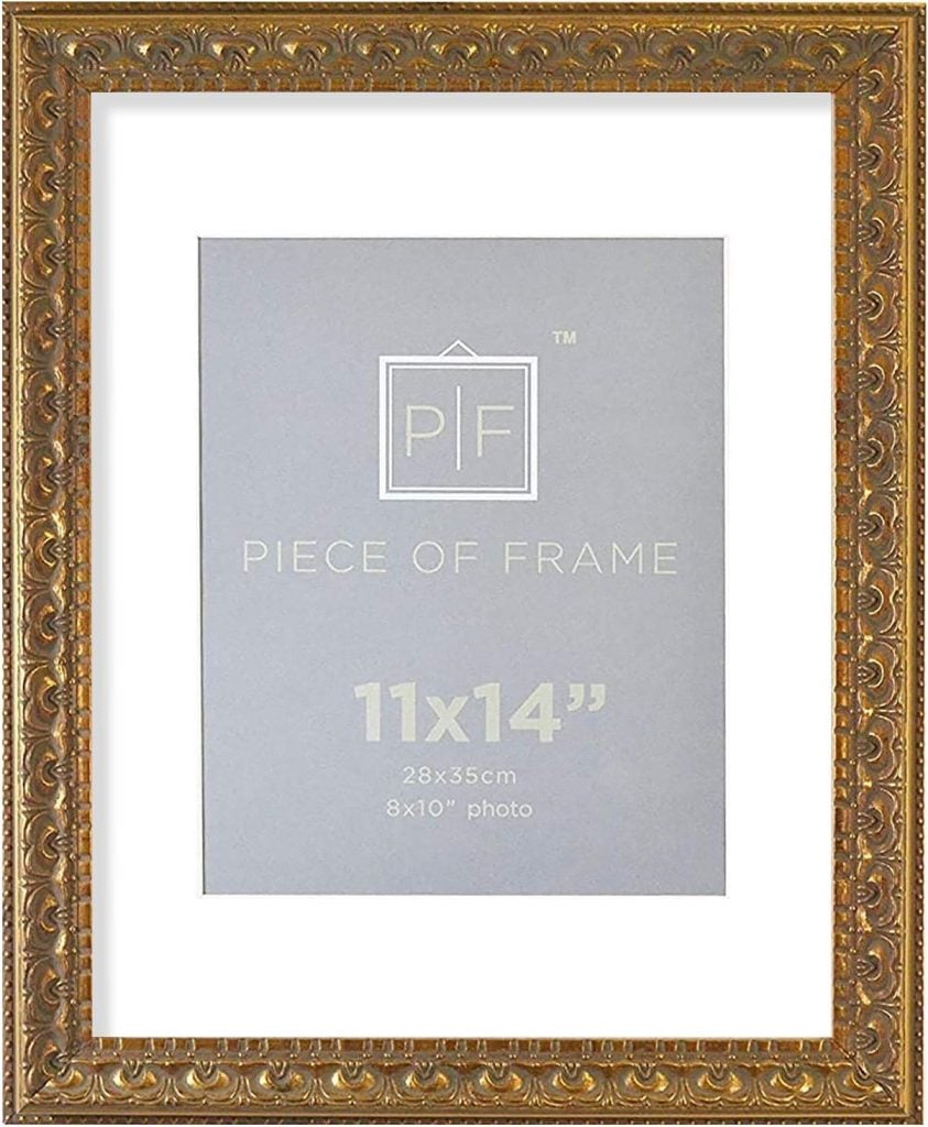 A gold frame with a picture of a picture.