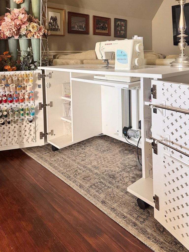 A sewing machine on a table.