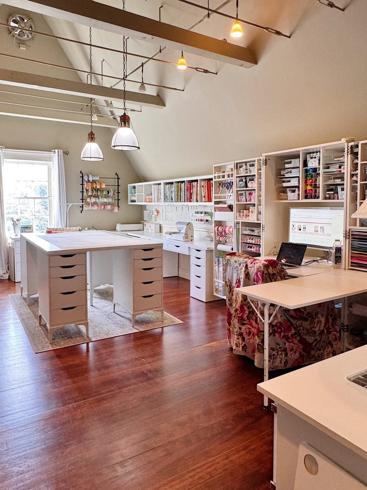 A room with a table and shelves.