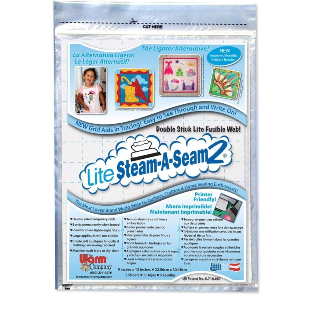 Package of Lite Steam-A-Seam 2 double stick fusible web showing product details, uses, and images of sample projects on the front.
