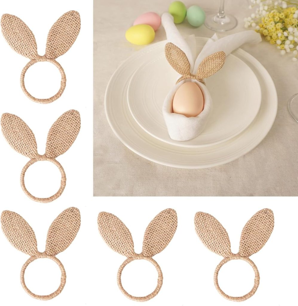 Six woven napkin rings shaped like bunny ears are shown, with one holding a white napkin and egg on a plate as a decorative table setting, alongside pastel eggs, flowers, and window wreaths for a festive touch.
