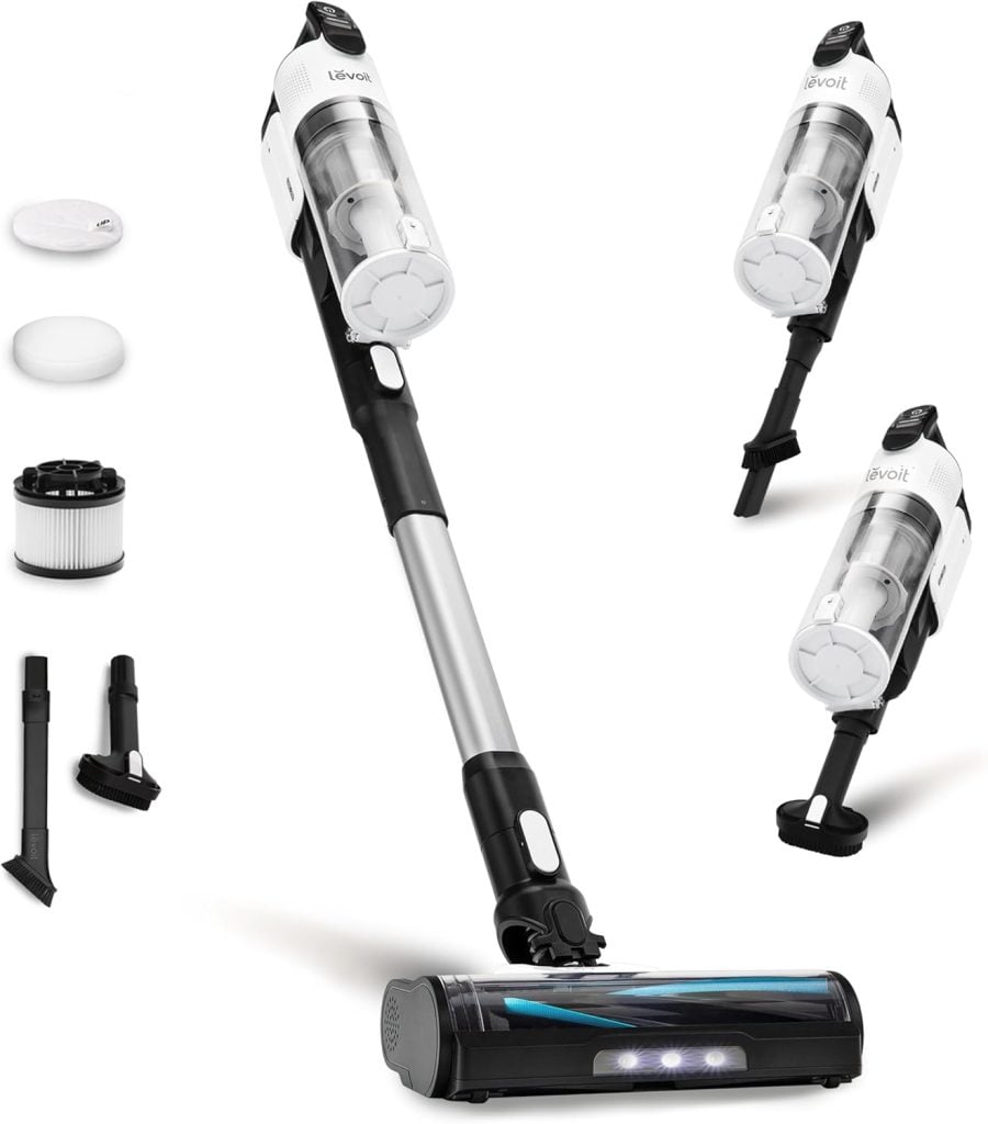 A cordless stick vacuum cleaner with attachments, extra filters, and interchangeable components displayed on a white background.