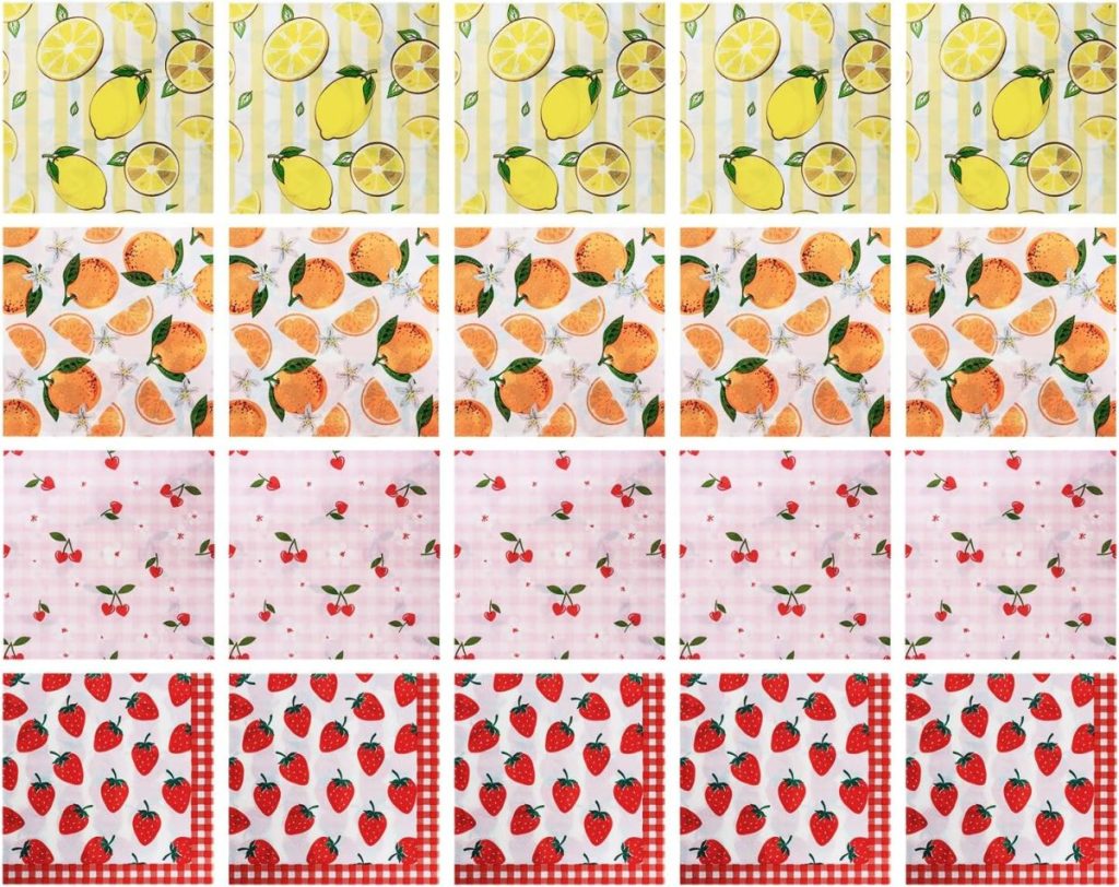 A grid of fruit-themed patterns: lemons on yellow, oranges on white, cherries on pink, and strawberries on red backgrounds, arranged in horizontal rows.