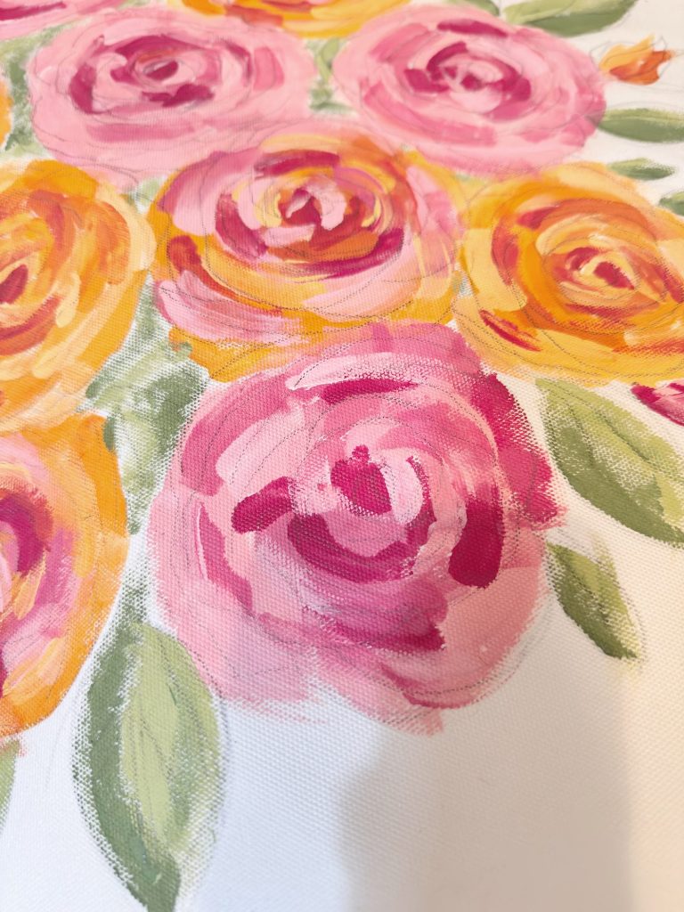 A close-up of a painting featuring pink and orange roses with green leaves on a white background.