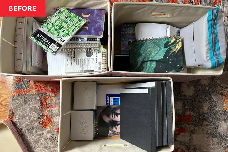 Three fabric bins on a patterned rug filled with notebooks, planners, folders, and boxes; a red "BEFORE" label appears in the top left corner.