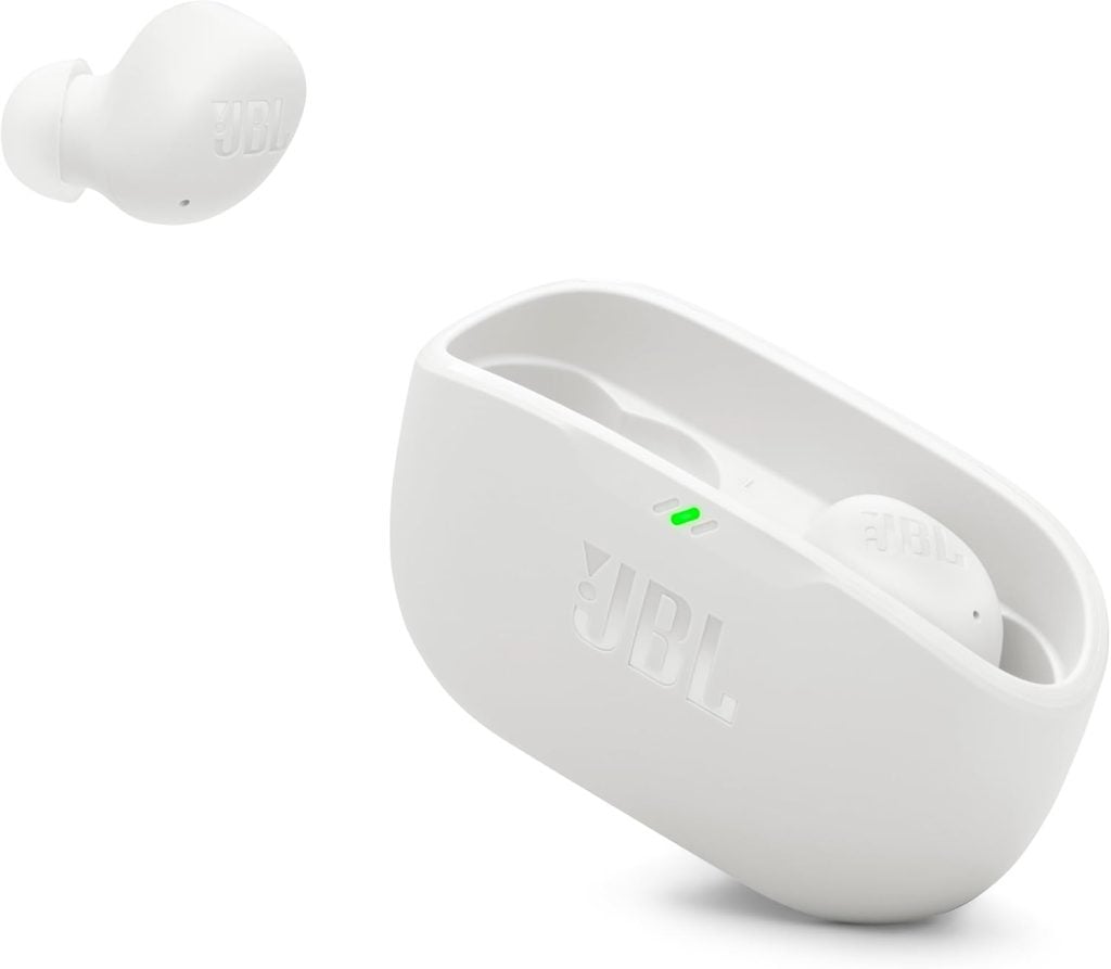 A white JBL wireless earbud set, with one earbud outside and one inside the open charging case featuring a green charging indicator light&mdash;perfect for scoring during the Amazon Big Spring Sale.
