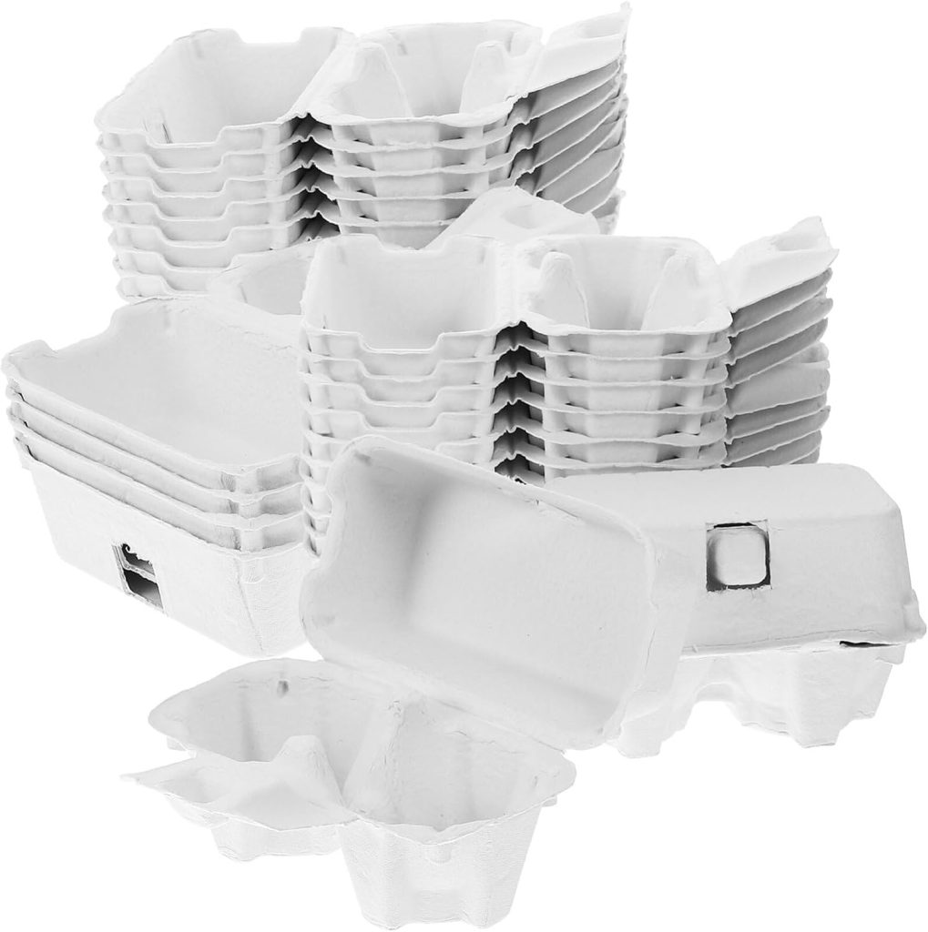 A stack of empty, white, rectangular paper pulp trays, commonly used for holding and transporting eggs, can also be repurposed for creative egg carton crafts.