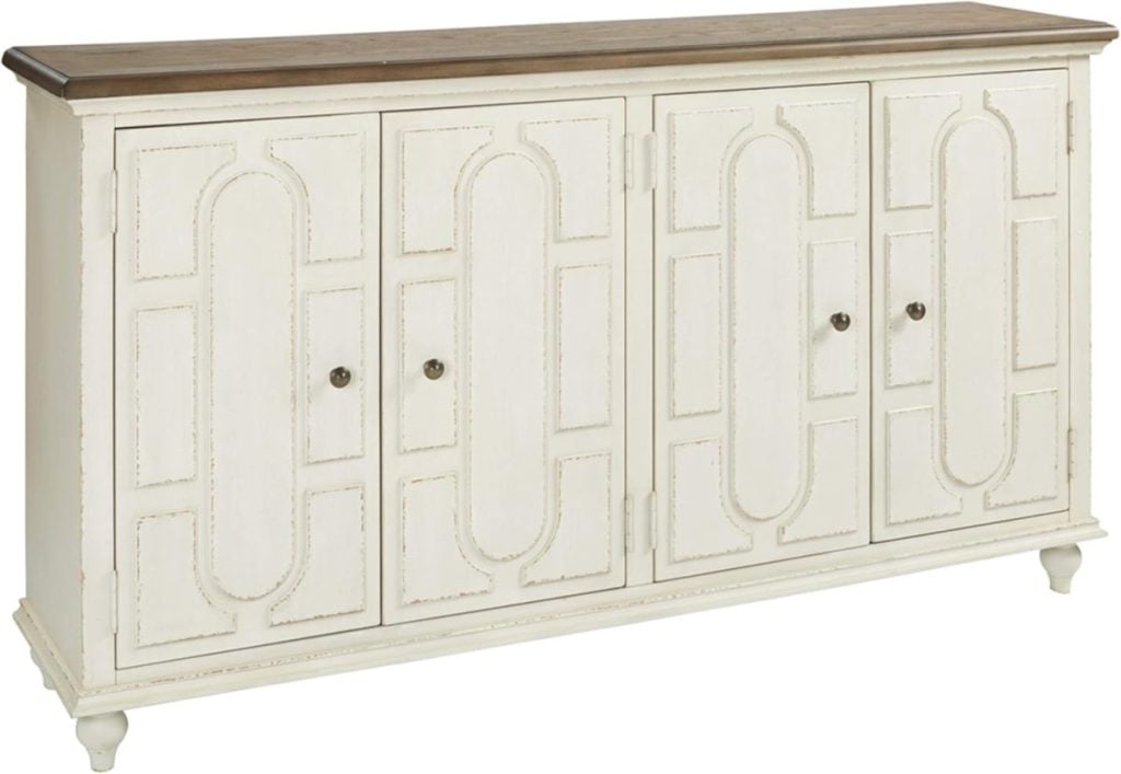 Cream-colored sideboard with four paneled doors, round metal knobs, and a contrasting wood top, standing on short legs&mdash;perfect for updating your space during the Amazon Big Spring Sale.