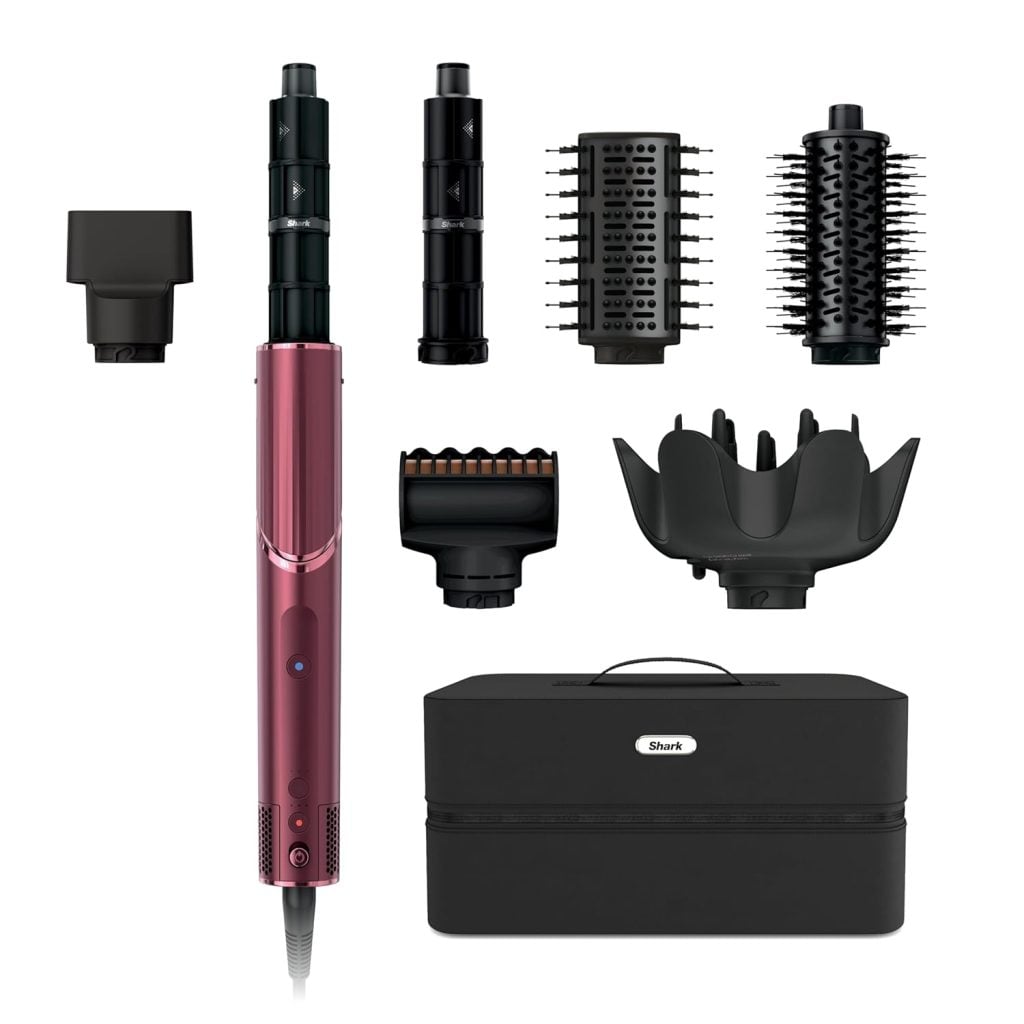 A red hair styling tool with six interchangeable attachments and a black storage case, all displayed on a white background&mdash;perfect for upgrading your routine during the Amazon Big Spring Sale.