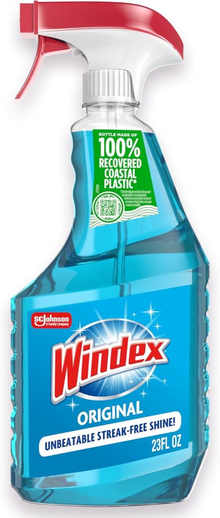 A 23 fl oz bottle of Windex Original glass cleaner with a red spray nozzle, perfect for keeping window wreaths sparkling, and a label stating "100% recovered coastal plastic" and "unbeatable streak-free shine.