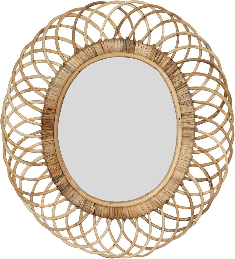 Round mirror with an oval reflective surface, framed by an intricate, woven rattan pattern in natural beige&mdash;perfect to refresh your space during the Amazon Big Spring Sale.