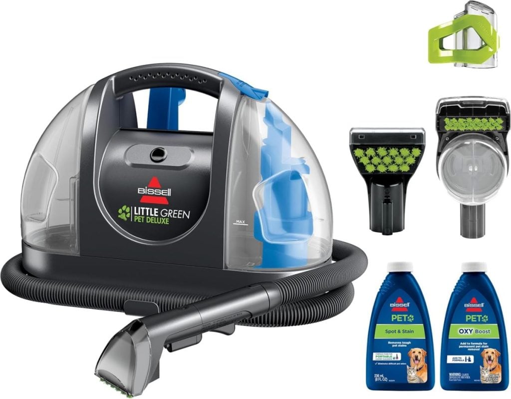 Bissell Little Green Pet Deluxe carpet cleaner with hose, cleaning attachments, and two bottles of cleaning solution displayed on a white background&mdash;perfect for freshening up your home during the Amazon Big Spring Sale.