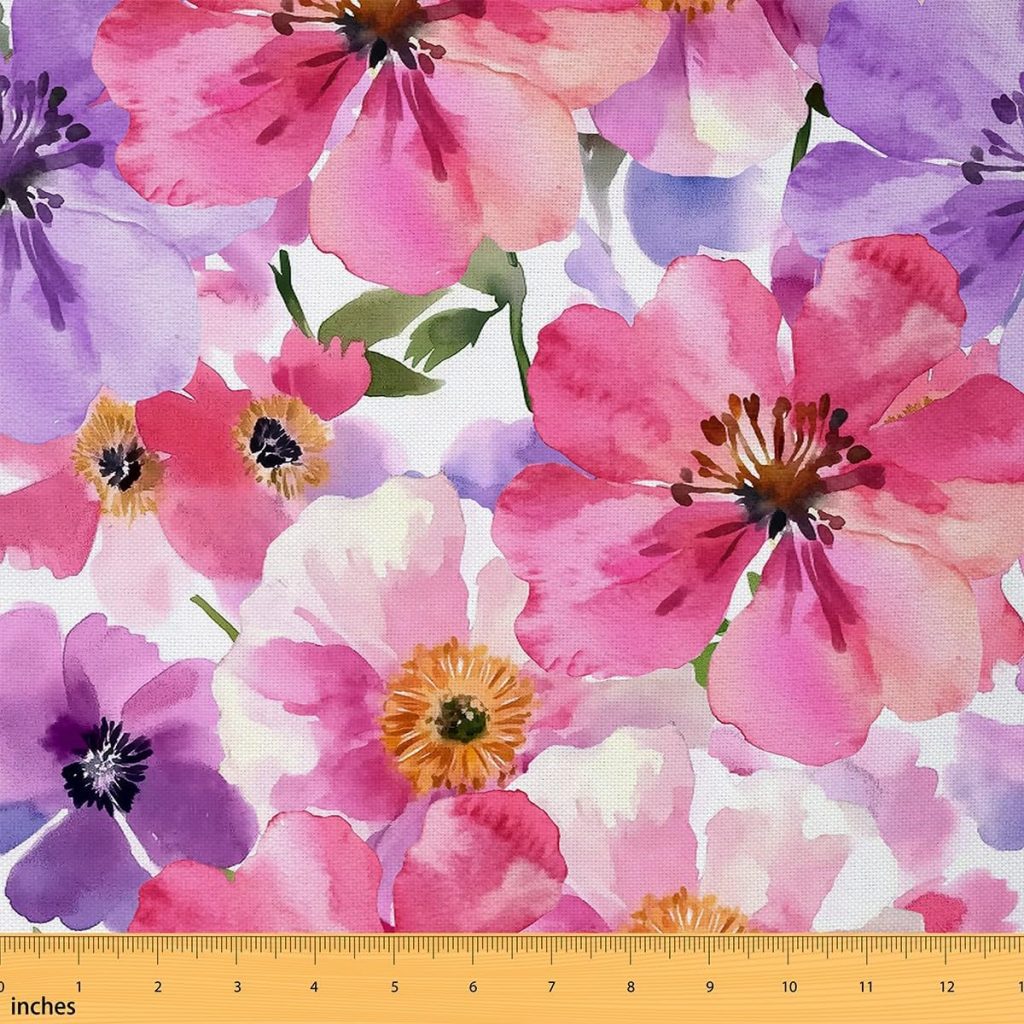 Watercolor-style painting of pink, purple, and yellow flowers with green leaves. A yellow ruler at the bottom shows measurements in inches from 0 to 13.