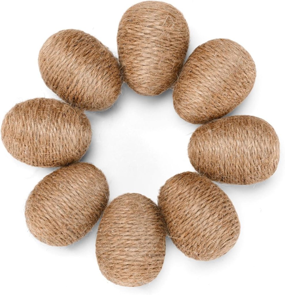 Eight brown, oval-shaped objects wrapped in twine are arranged in a circular pattern on a white background.