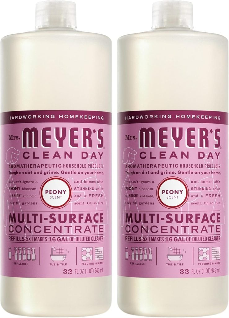 Two 32 fl oz bottles of Mrs. Meyer's Clean Day Peony Scent Multi-Surface Concentrate, labeled for hardwood, tile, and tubs, with pink and purple design&mdash;perfect for fresh spring cleaning during the Amazon Big Spring Sale.