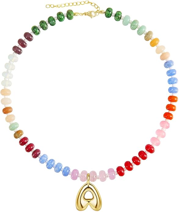 A beaded necklace with multicolored round beads and a gold heart-shaped pendant, featuring a gold adjustable clasp.