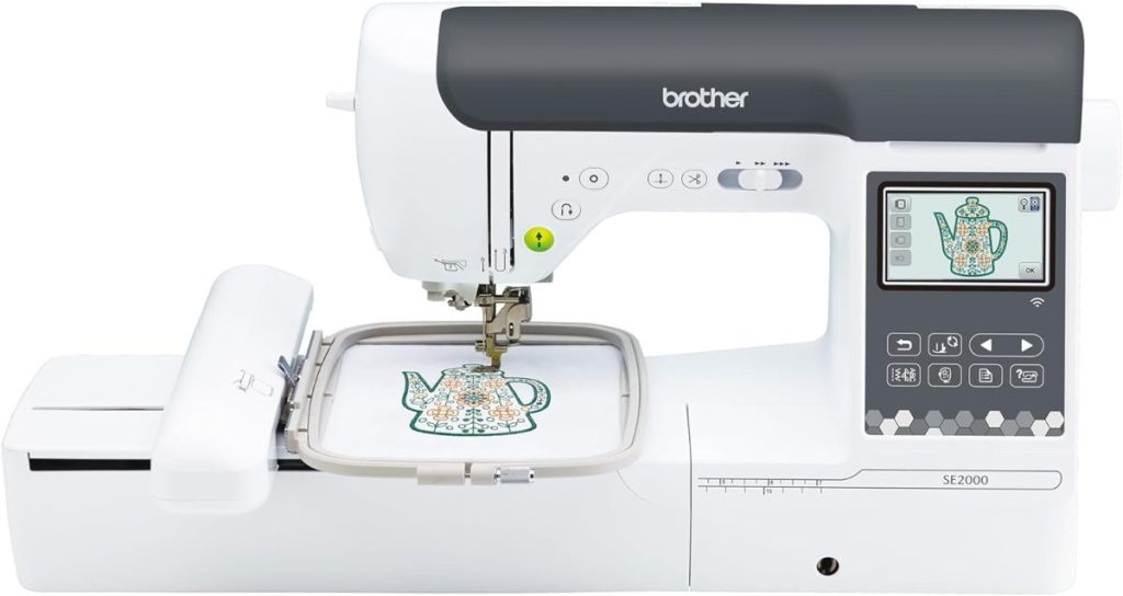Brother SE2000 embroidery and sewing machine with digital screen, displaying a teapot design being embroidered on white fabric in the machine's hoop.